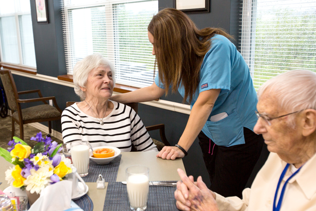 caregiver with a storypoint group community resident