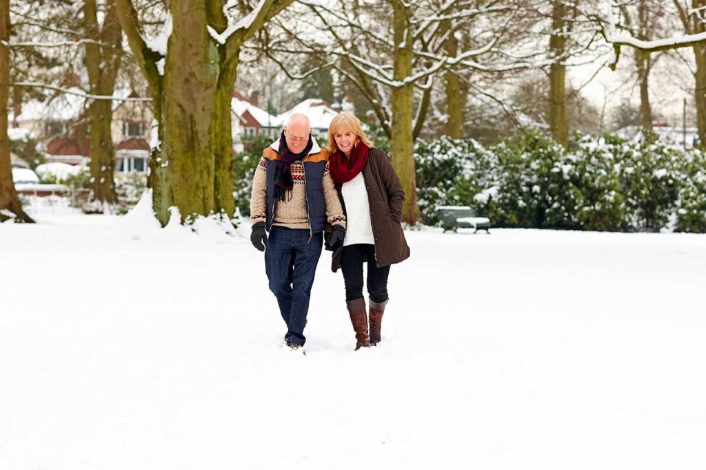 seniors going on a walk in the winter