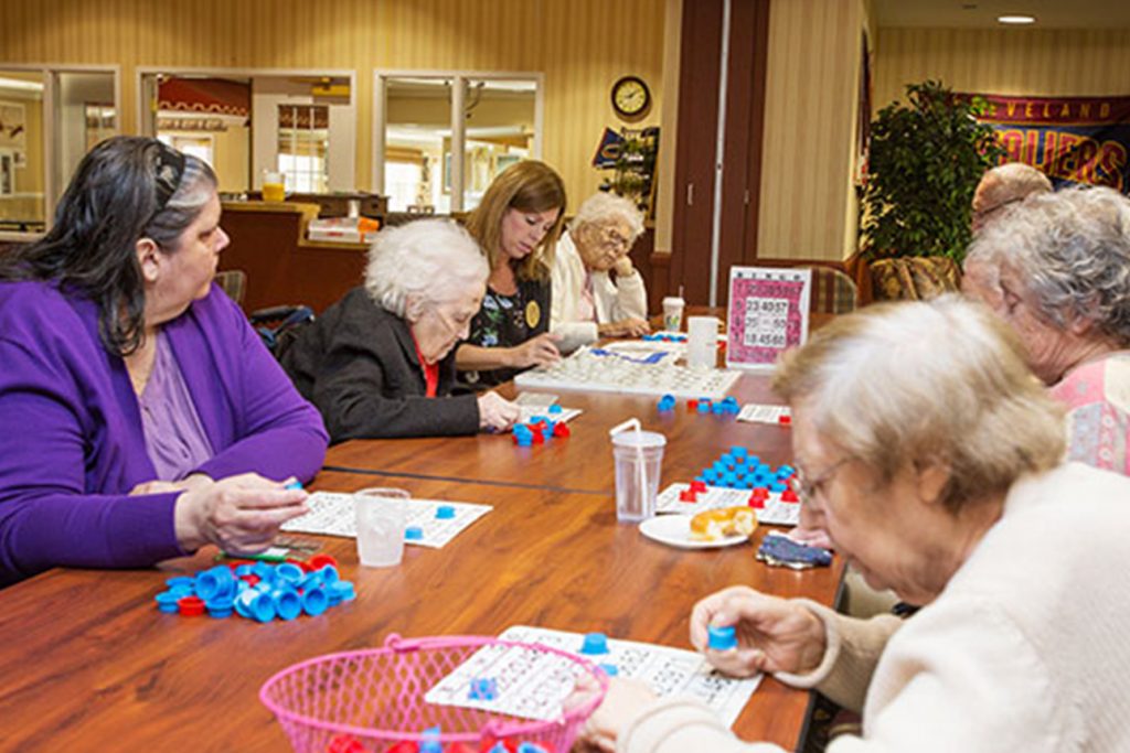 StoryPoint residents socializing and attending community activities to help them adjust to their new life.