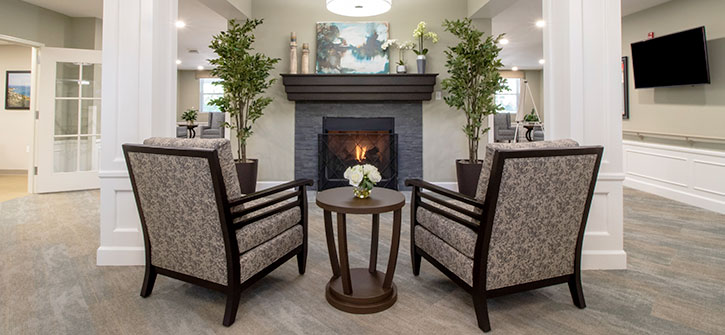StoryPoint seating area by a fireplace