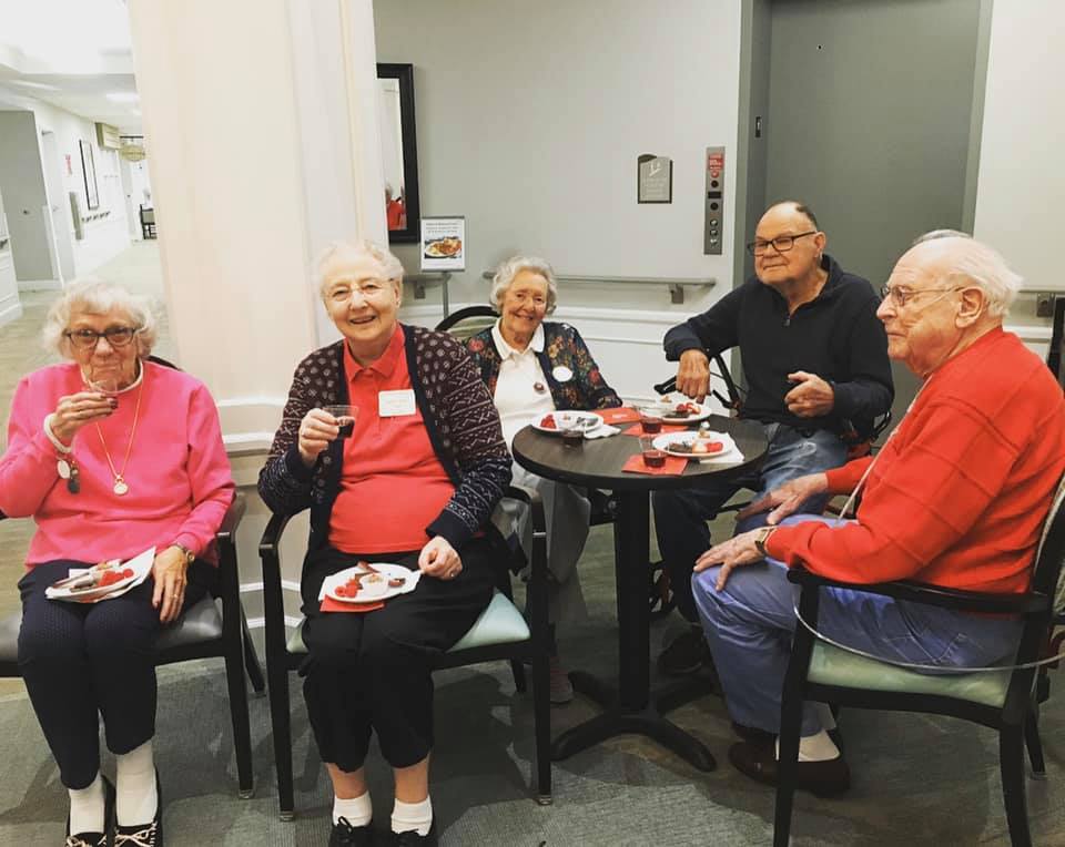 group of residents enjoying dessert together