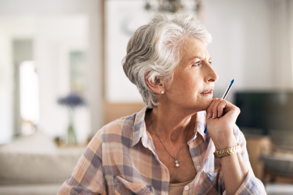 senior woman thinking looking outside