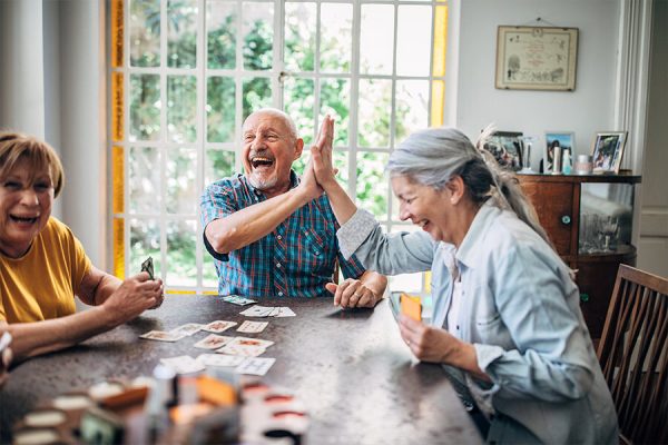 Enhanced Living residents playing cards