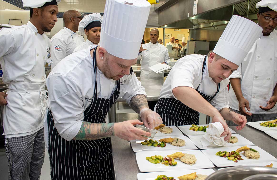 independence village chefs competing in a culinary competition 