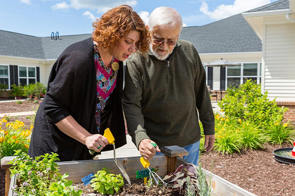 woman and man gardening