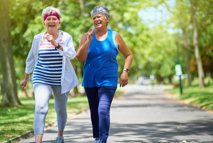 senior living residents staying active by walking