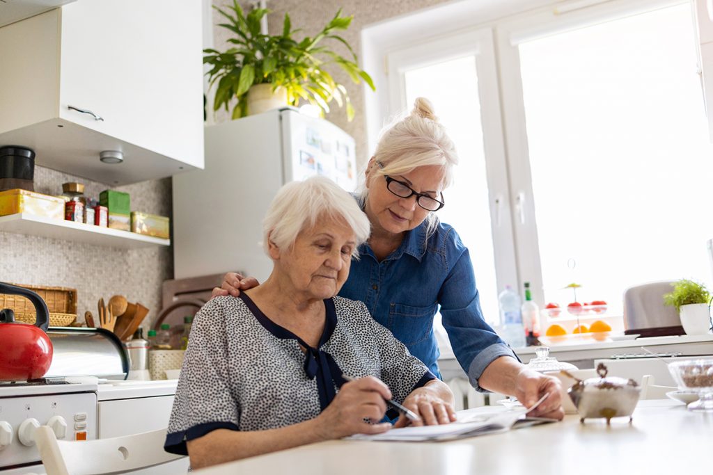 Mother and daughter discussing senior living