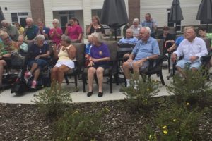 StoryPoint residents outside on patio