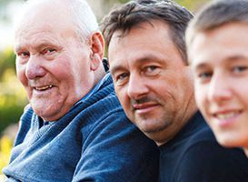 senior man with his son and grandson