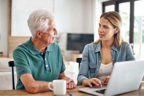 woman talking to her elderly father