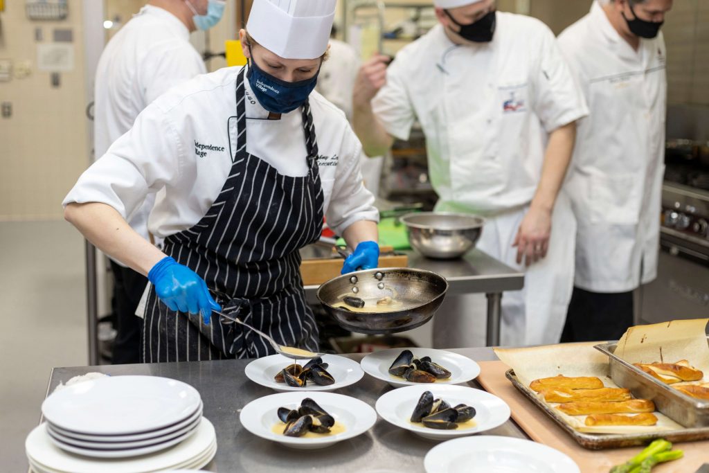 StoryPoint Chef plating food at Dorsey Culinary Competition