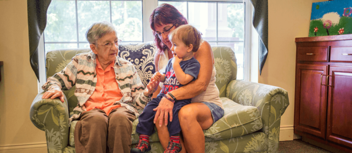 Leisure Living Ludington Woods resident with daughter and great grand child