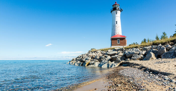 Lake Superior beach with lighthouse