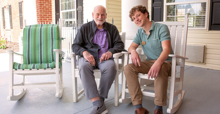 StoryPoint resident and caregiver on porch