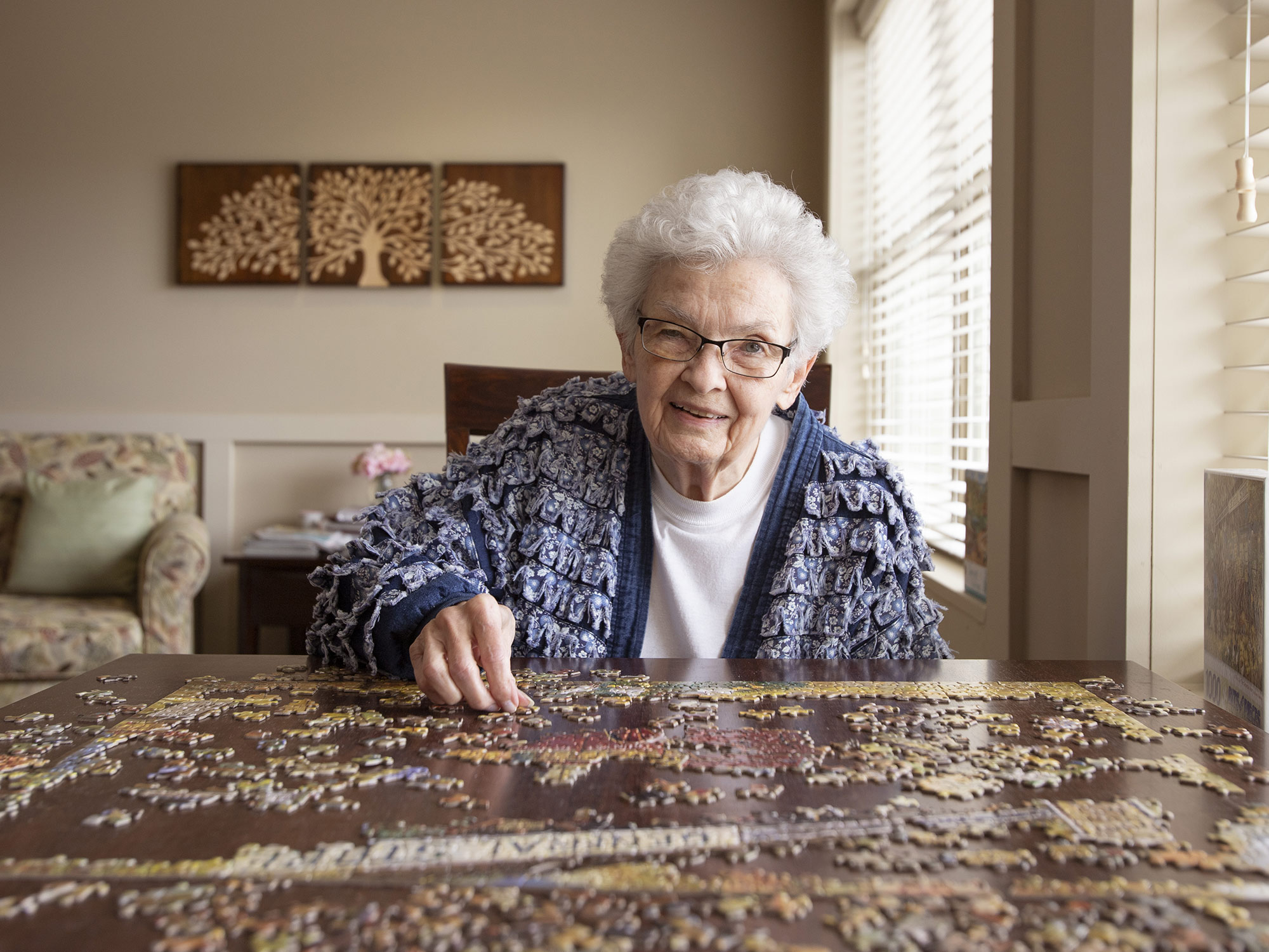 senior solving a puzzle 