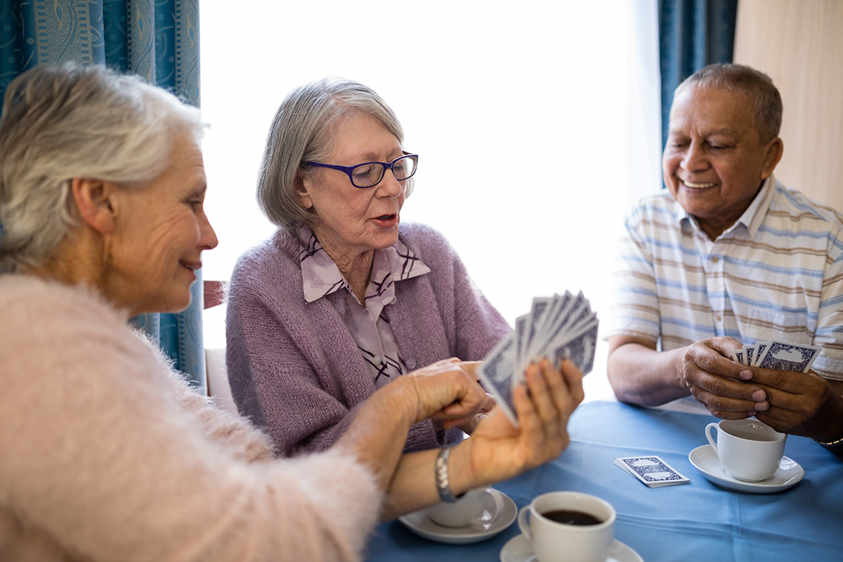 seniors playing cards