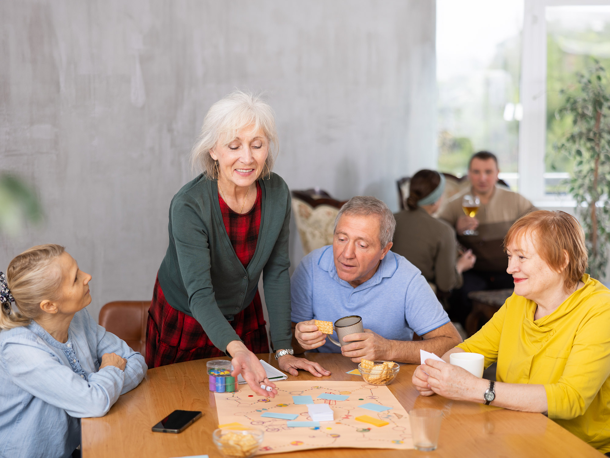 seniors playing a board game