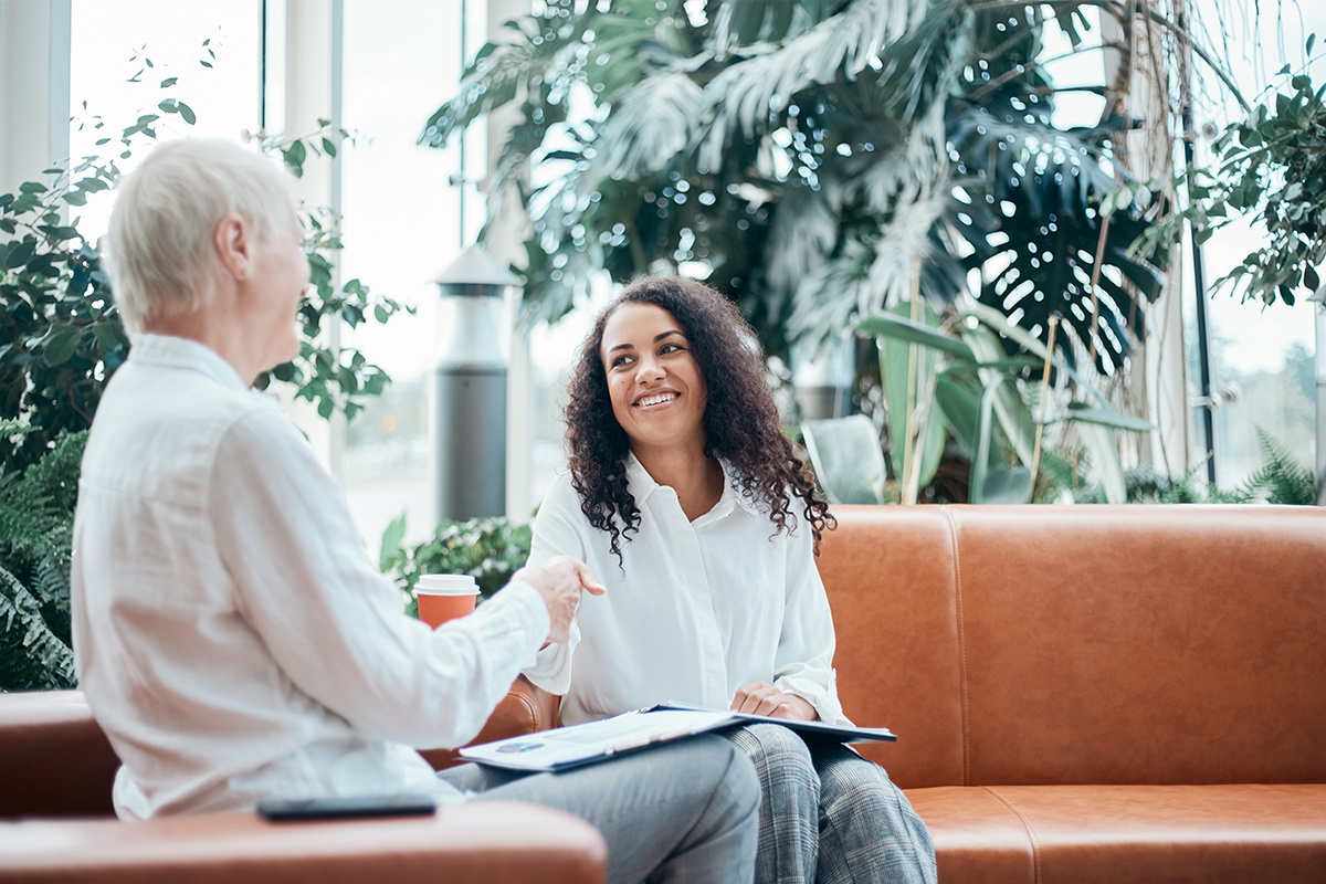 senior and financial planner talking