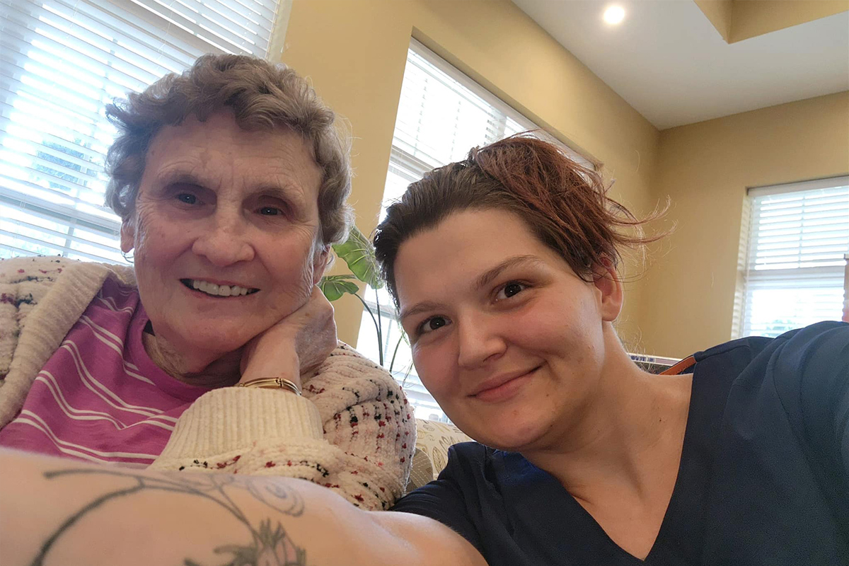 StoryPoint Group Caregiver with a memory care resident