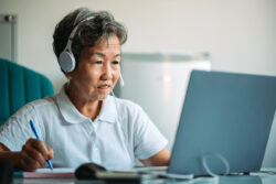 senior woman on a laptop