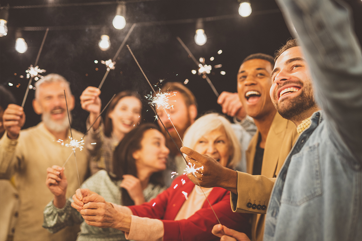 people holding sparklers