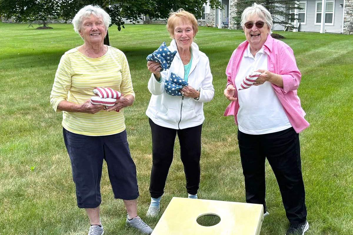 StoryPoint residents playing cornhole