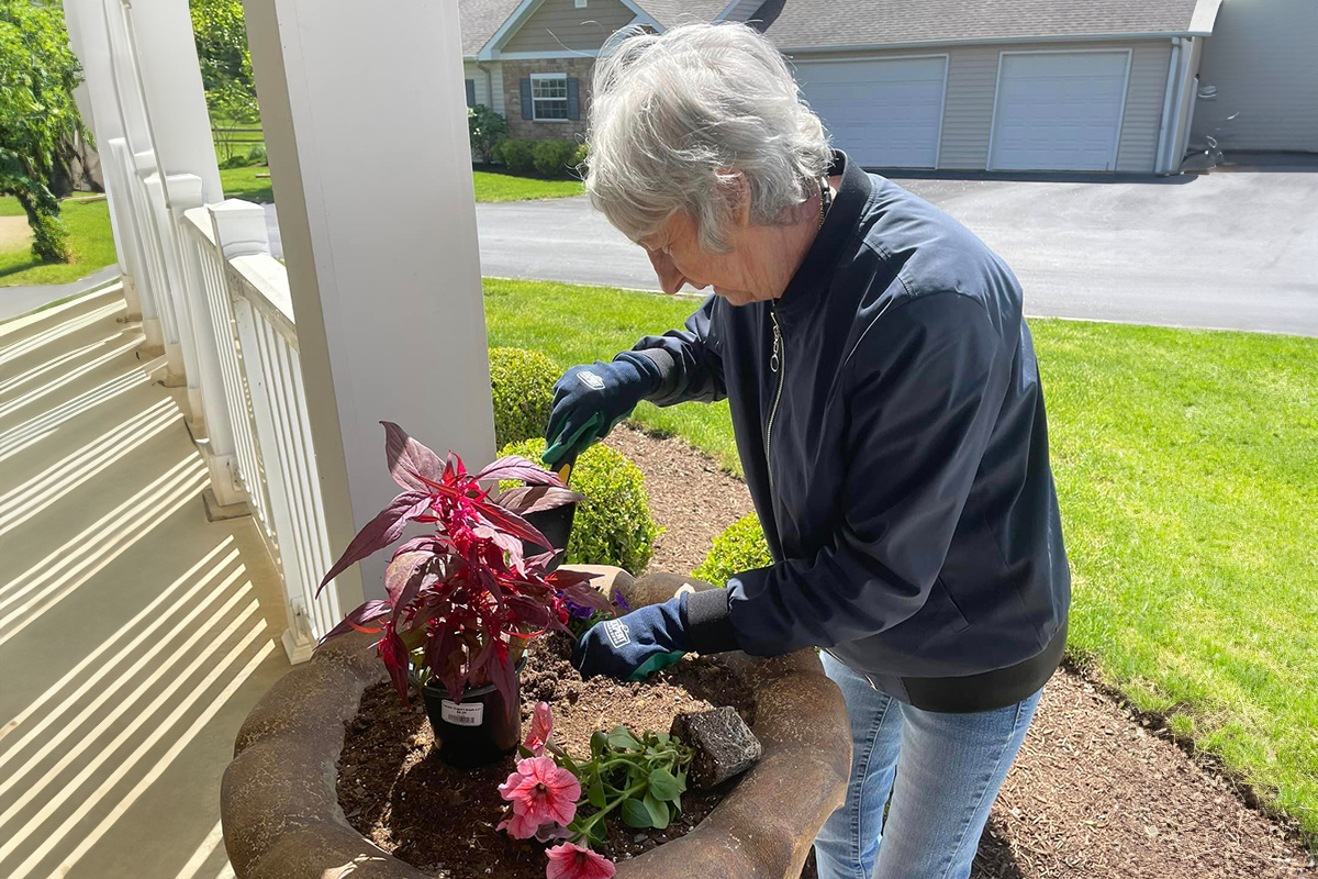 Danbury Resident planing flowers 