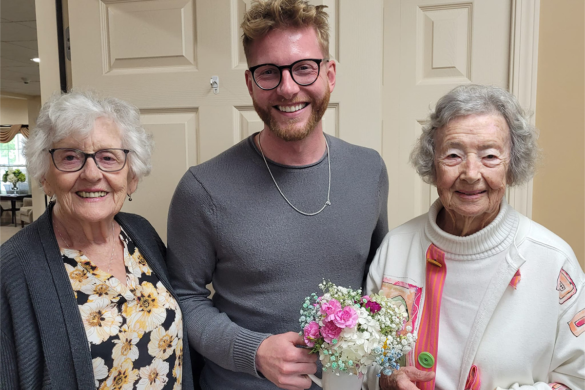 Oliver Woods residents receive a flower delivery.