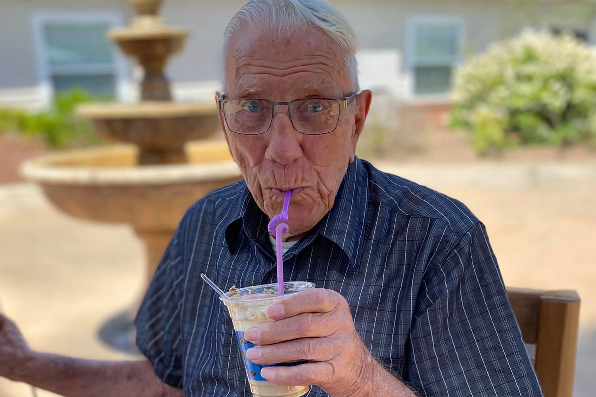 Danbury Massillon Resident drinking a milkshake