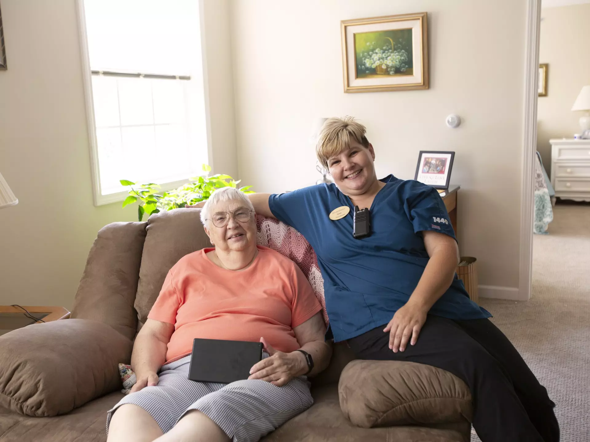 StoryPoint Group caregiver with resident